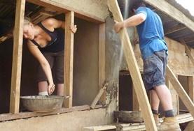 Ghana Volunteers work on building the framework for a house being constructed in a local community in Ghana.