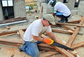 Philippines Volunteers work on constructing the framework for a new classroom being built in the Philippines.