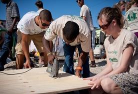 South Africa Building volunteers work together to construct a community centre in a local township in South Africa.