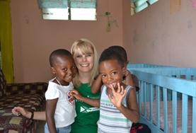 Jamaica A volunteer spends time with local children at a daycare centre in Jamaica.