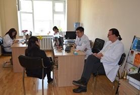 Mongolia A Psychology volunteer meets with local mental health professionals to discuss treatment techniques in Mongolia.