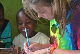 Care & Community A Care & Community volunteer spends time volunteering with children in Ghana over the Christmas period.