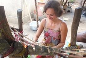 Togo An Arts & Crafts volunteer learns how to weave using a traditional loom at her placement in Togo.