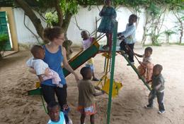 Togo A volunteer spends time working with children in a playground at her Care & Community placement in Togo.