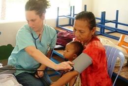 Medicine & Healthcare A high school student gains medical experience by measuring blood pressure during a volunteer Public Health outreach in Cambodia.
