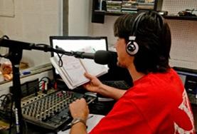 Argentina A Journalism intern observes as a radio DJ demostrates the basics of radio journalism in Argentina.
