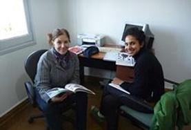 Language Courses A volunteer learns Spanish from her language course tutor in Argentina.