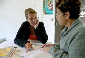 Language Courses A volunteer works through an exercise with her Spanish tutor as part of her language course in Mexico.