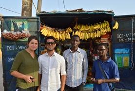 Language Courses Volunteers practise their newly learned Wolof language skills with local vendors in Senegal.