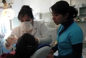 Medicine & Healthcare A volunteer observes as a local dentist examines a patient at our Dentistry internship placement in Argentina.
