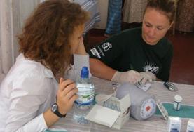 Sri Lanka Midwifery volunteers doing a medical internship in Sri Lanka assist with preparing medication in the maternity department of a hospital.