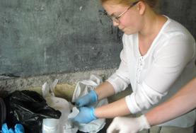 Togo A Midwifery intern assists with preparing medication for newborn babies at a hospital in Togo.