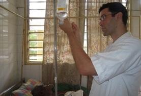 Medicine & Healthcare A Nursing intern assists with the care and treatment of patients at a local hospital in Togo.
