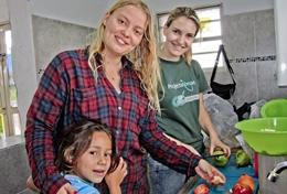 Bolivia Nutrition volunteers cook healthy meals which will be distributed in a local community in Bolivia.