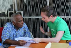 Medicine & Healthcare A Nutrition intern measures a man's blood sugar level during a diabetes awareness campaign at our volunteer placement in Fiji.