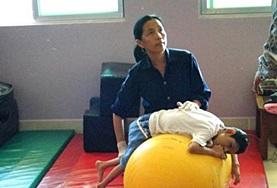 Medicine & Healthcare A local physiotherapist demonstrates a treatment technique to Physiotherapy interns at our volunteer placement in Cambodia.