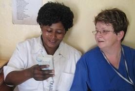 Tanzania A Physiotherapy volunteer speaks to a local medical staff member about treatment techniques in Tanzania.
