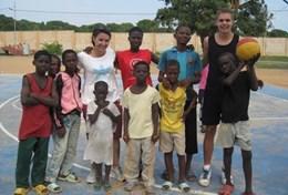Ghana A Sports volunteer poses with a group of children after coaching them and improving their fitness at our Multi-sports placement in Ghana.